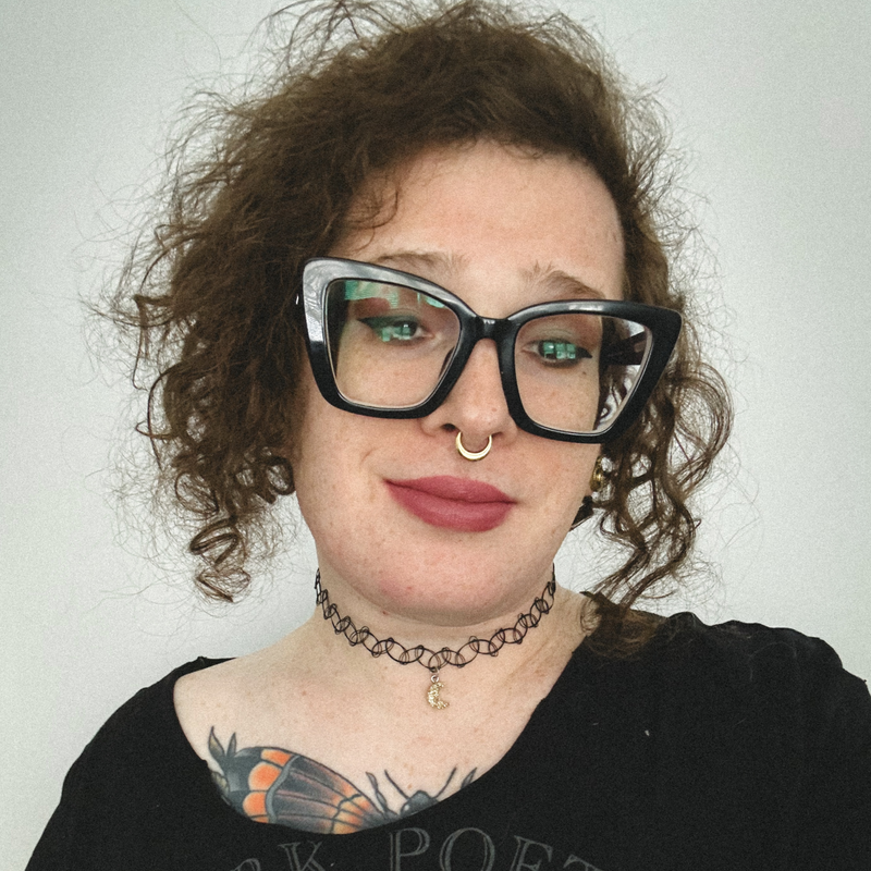 a photo of parker lee from the chest up on a white background.